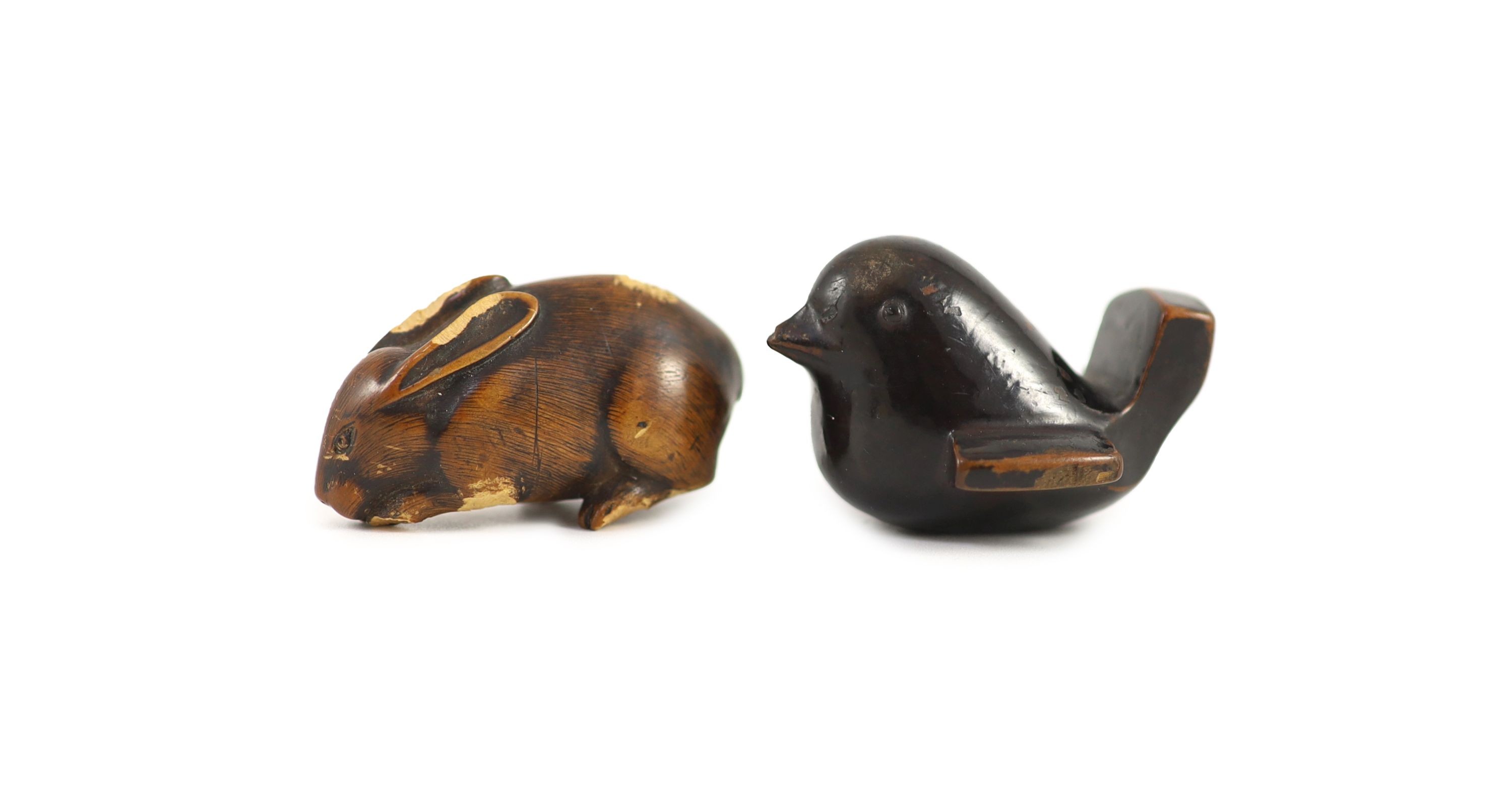 A Japanese lacquered wood netsuke of a bird and a wooden netsuke of a rabbit, 18th/19th century